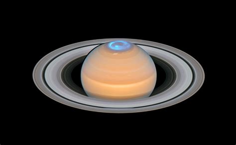 ESA - Hubble observes energetic lightshow at Saturn’s north pole