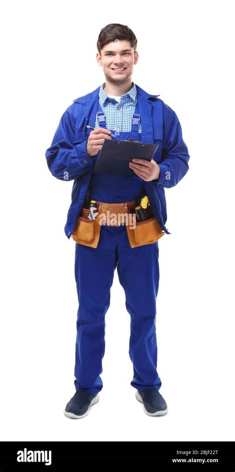 Plumber in uniform holding clipboard on white background Stock Photo ...