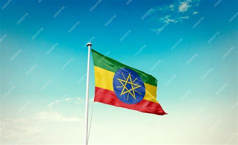 Premium Photo | Ethiopia national flag waving in the sky