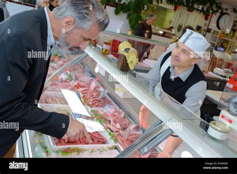 the meat vendor Stock Photo - Alamy