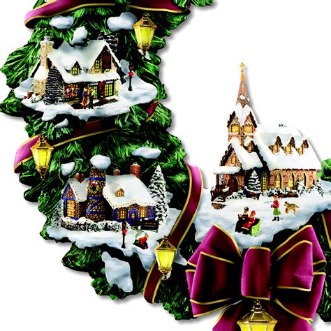 The Thomas Kinkade Illuminated Christmas Village Wreath - Hammacher ...