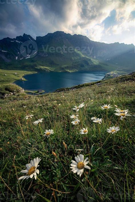 A mountain lake with dramatic sunset 20863646 Stock Photo at Vecteezy