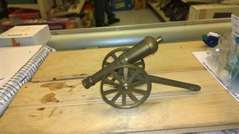 I have a mini solid brass cannon I would like to know the value of.