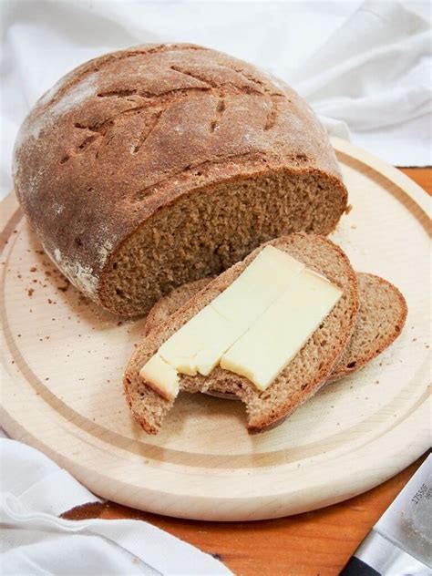 sourdough rye bread with slice topped with cheese | Rye bread recipes ...