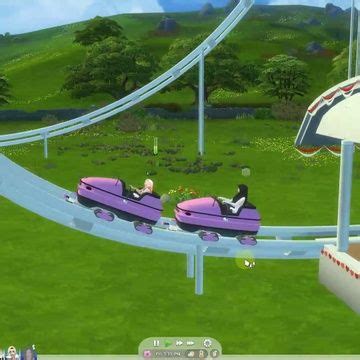 two people ride on roller coasters in an animated video game