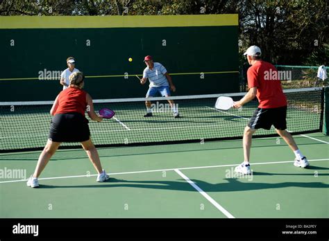 Senior citizens compete in game of Pickleball in the Senior state ...