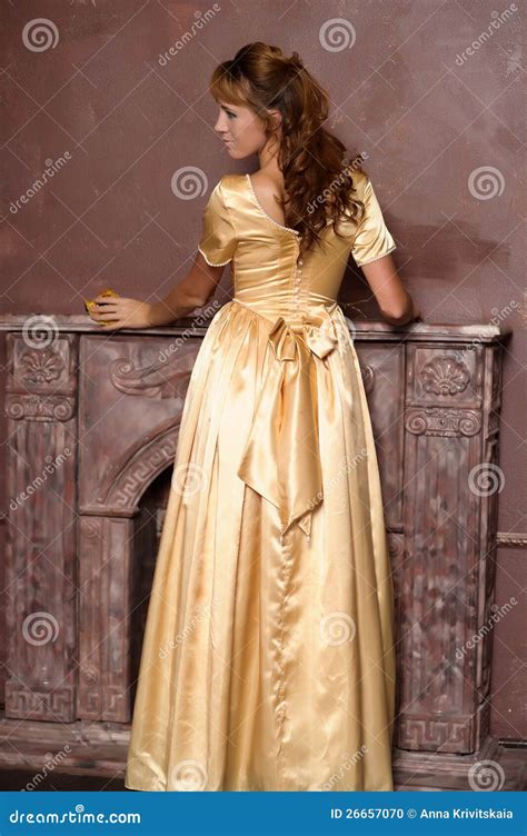 Beautiful Girl in Golden Dress Stock Photo - Image of disco, exotic: 26657070