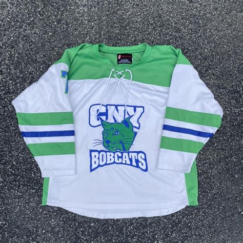 Vintage hockey jersey white & green Good overall... - Depop