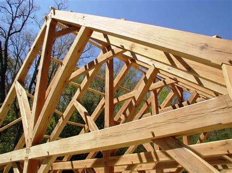 Timber frame trusses create an open and dramatic effect