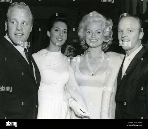 BING CROSBY's sons Phil (left) with wife Sandra and Dennis with wife ...