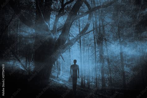 scary ghost in dark fantasy forest at night Stock Photo | Adobe Stock