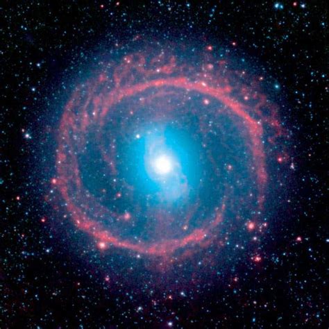 Churning galaxy boasts a fiery halo of baby stars | New Scientist