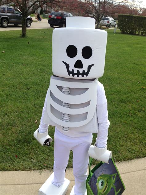 Aidan's Lego skeleton costume, also glows in the dark and has a fan ...