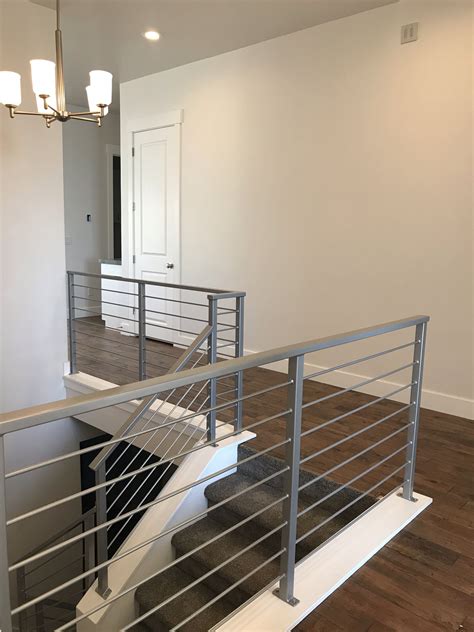 Breton entry | Modern stair railing, Home stairs design, Contemporary stairs