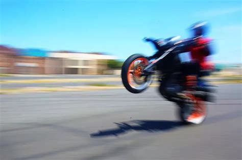 'Show-off' wheelie motorcyclist suffers broken back and pelvis ...