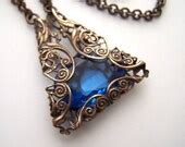 Items similar to Vintage Filigree Necklace in Sapphire on Etsy