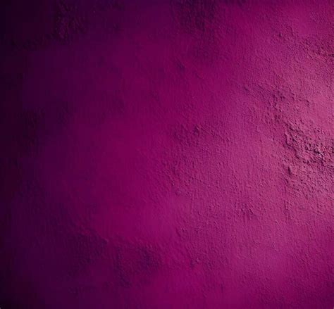 Premium AI Image | magenta wall with concrete texture