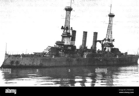 USS New Jersey (BB-16) listing after aireal bombing attack Stock Photo - Alamy