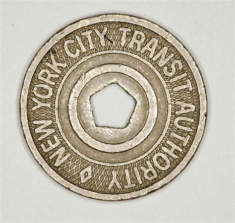 This token is the fifth version of the New York City subway token. The ...