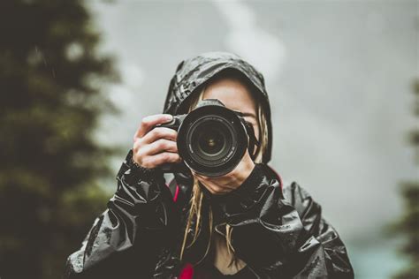 Camera Woman Rain Jacket Royalty Free Photo