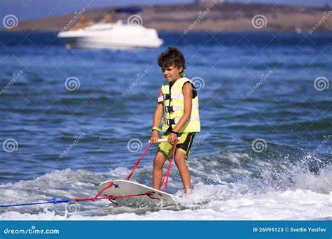 Children's water skiing. stock image. Image of speed - 26995123