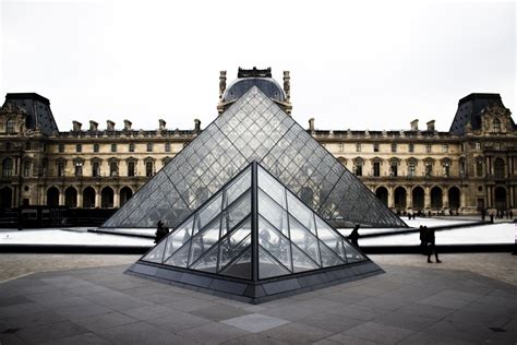 the illuminated pyramid in front of the louvre museum in paris at night, louvre pyramid at night ...