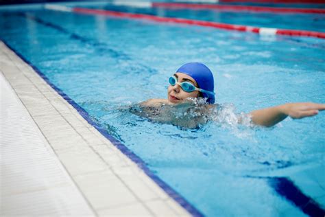 Person in Swimming Goggles in Swimming Pool · Free Stock Photo