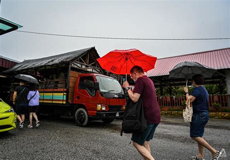 Landslides, floods and bad weather: Is Malaysia safe to visit during the monsoon season? - CNA