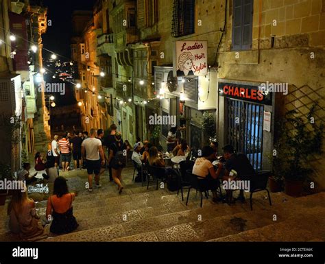 Bars & restaurants in the alleys of Valletta, Malta Stock Photo - Alamy