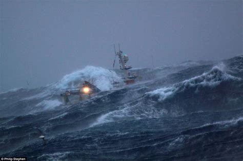 North Sea trawlermen: Fishing boat battered by waves as brave crew carry out the most dangerous ...