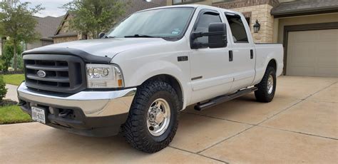 Before and after pictures of 2" level kit on 2WD 03 Ford F250 - Ford Truck Enthusiasts Forums