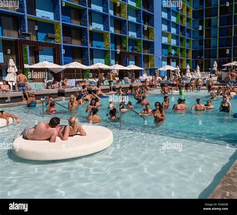 Las Vegas, Nevada. Millennials Relaxing at the Pool, The Linq Hotel ...