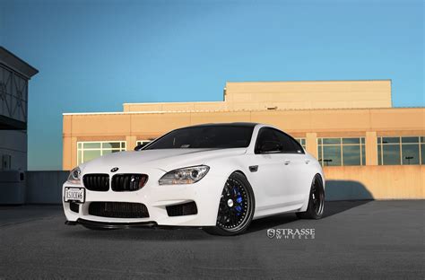 White BMW 6-Series Wearing Black Rims Featuring Blue Calipers — CARiD ...