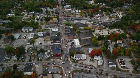 5.5K stock footage aerial video flying by Broadway, downtown in autumn ...