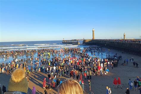 IN PICTURES: Whitby Boxing Day dip draws huge crowds to beach