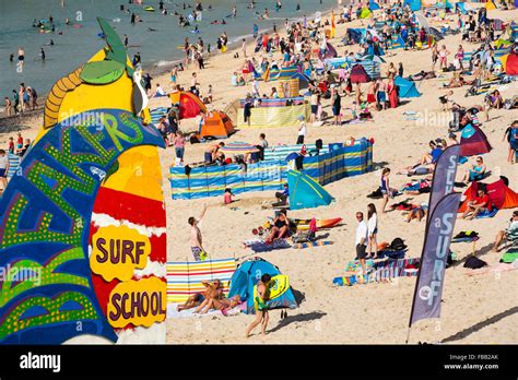 Holiday makers on the beach in St Ives, Cornwall, UK Stock Photo - Alamy