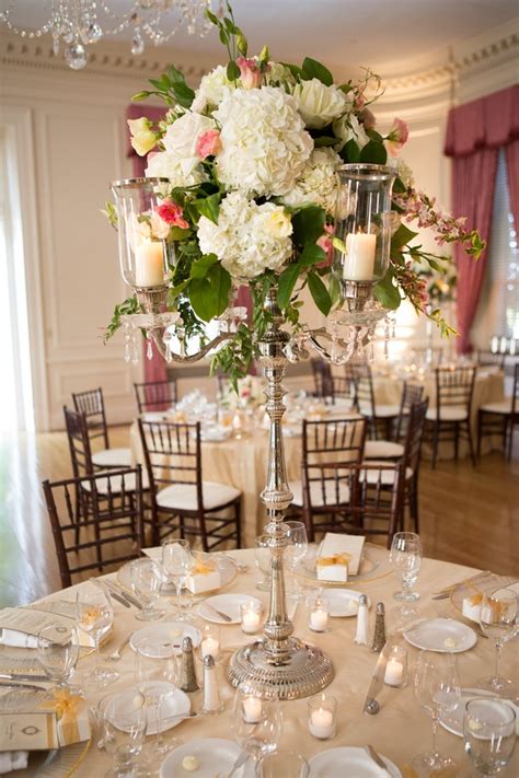 Reception Décor Photos - Silver Candelabra Centerpiece - Inside Weddings