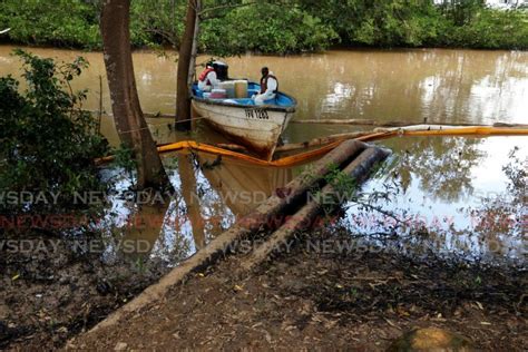 Oil spill cleanup continues in Woodland - Trinidad and Tobago Newsday