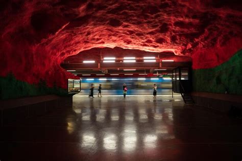 Premium Photo | Illuminated subway tunnel at subway station