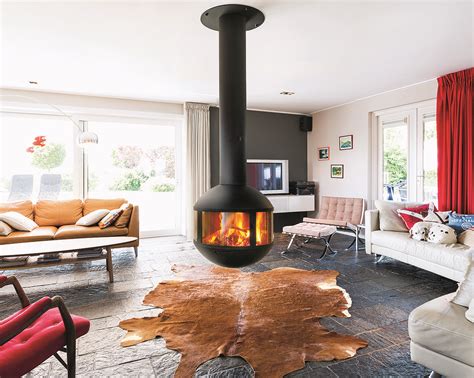 Warm up by a stove any time of year | Home fireplace, Sleek fireplace, Modern woodburner