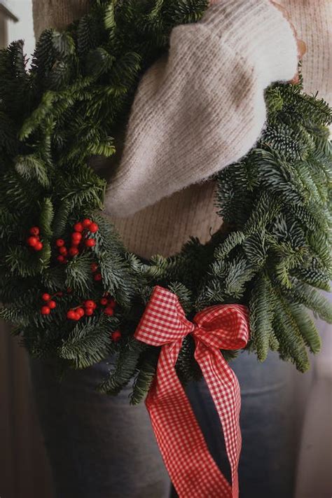 A Green Wreath with Red Ribbon · Free Stock Photo