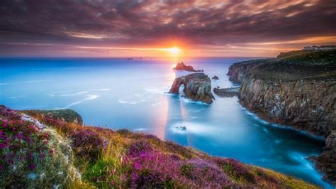 Cornish coastal sunset scenery at Lands End - backiee