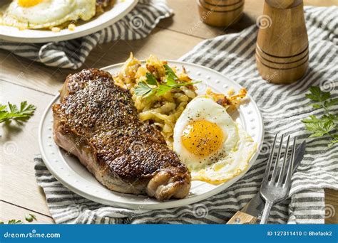 Homemade Steak and Eggs Breakfast Stock Photo - Image of fresh, onion ...