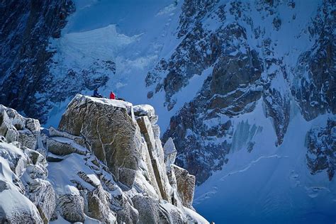 HD wallpaper: person standing on top of snowy mountain, rock, cliff ...