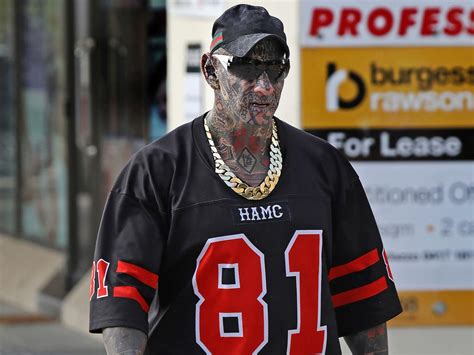 Hells Angels bikie: Dayne Brajkovich shows off facial tattoos, gold chain | Daily Telegraph