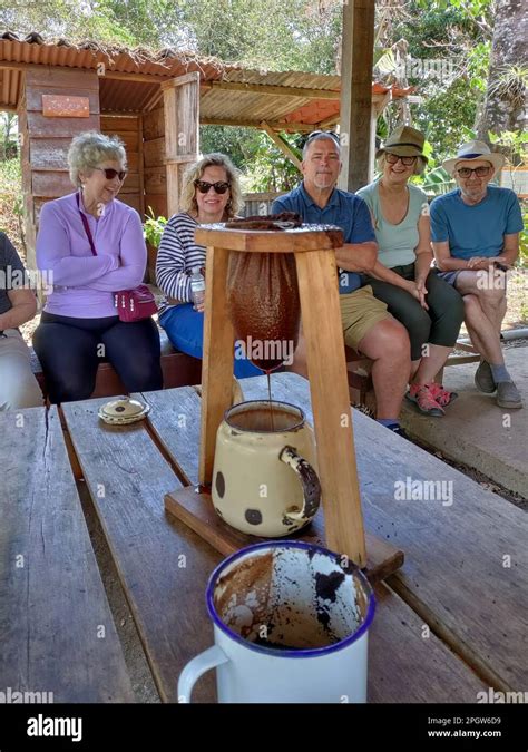 Naranjo, Costa Rica - Tourists watch coffee brewing in a chorreador at ...