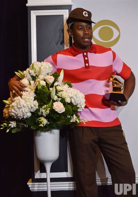 Photo: Tyler, the Creator wins award at the 62nd annual Grammy Awards in Los Angeles ...