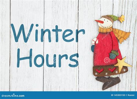 Winter Hours Sign with Snowman Stock Photo - Image of christmas, white: 145303150