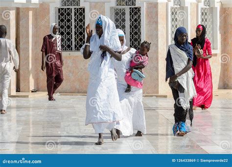 Unidentified Senegalese People in Long Traditional Clothes Walk ...