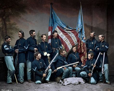 Union soldiers informally pose together from the color guard of the 7th ...